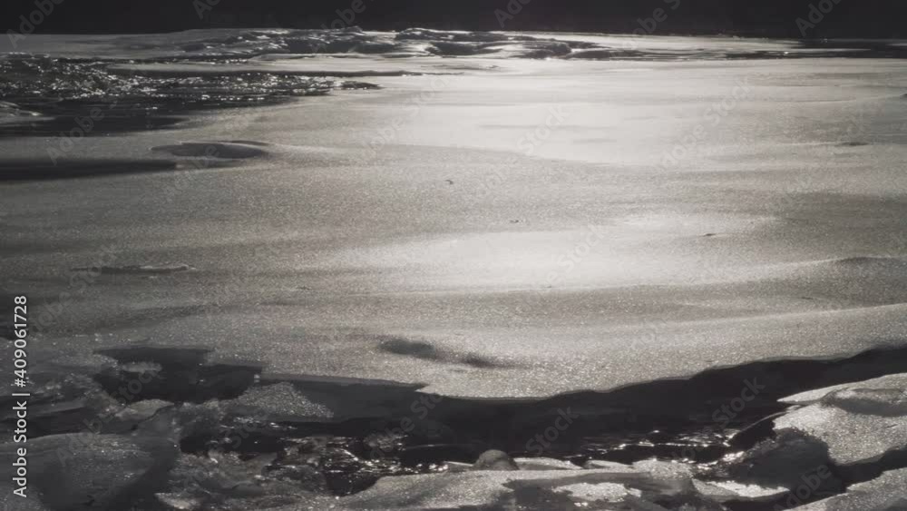 Mountain river in winter. Icebreaker of ice floes. Winter. Cold. Rock in ice. Sun on the ice Mountain river in winter. Icebreaker of ice floes. Winter. Cold. Rock in ice. Sun on the ice