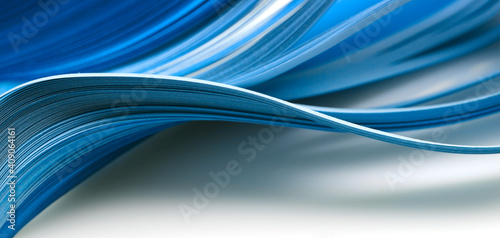 Abstract blue color wave curl strip paper background.