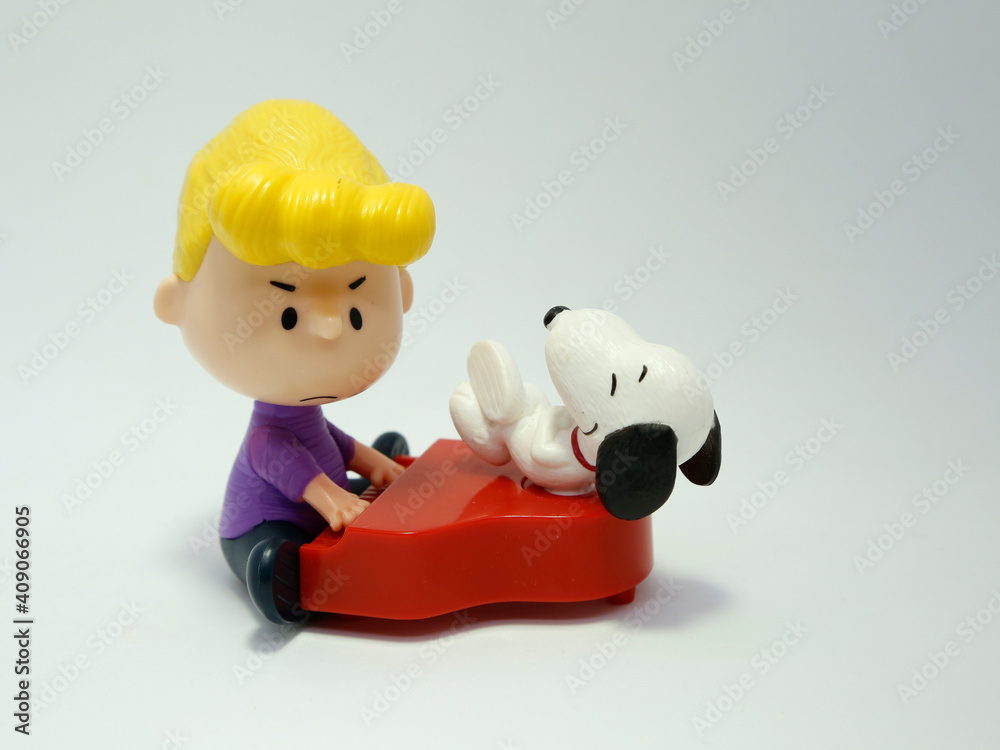 Schroeder friend of Charlie Brown and Snoopy. Comic Peanuts. Pianist. Red piano. Music. Child
