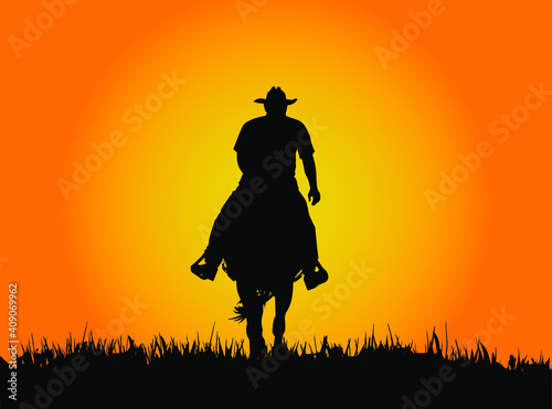 cowboy riding horse © kris