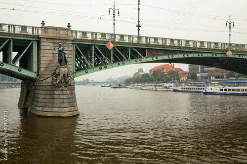 Beautiful view of a bridge over river Vltava in Prague, Czech Republic photo