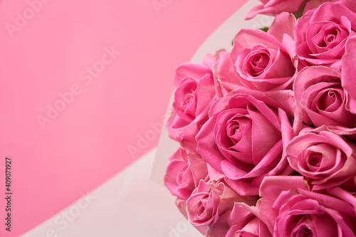 Background of beautiful pink roses with copy space