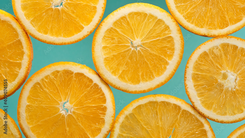 Obraz premium Closeup slice of orange fruit background,pattern background
