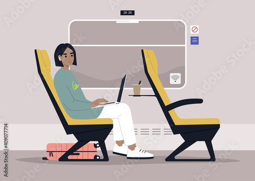 Young female commuter rides a train next to a window, modern lifestyle and travel