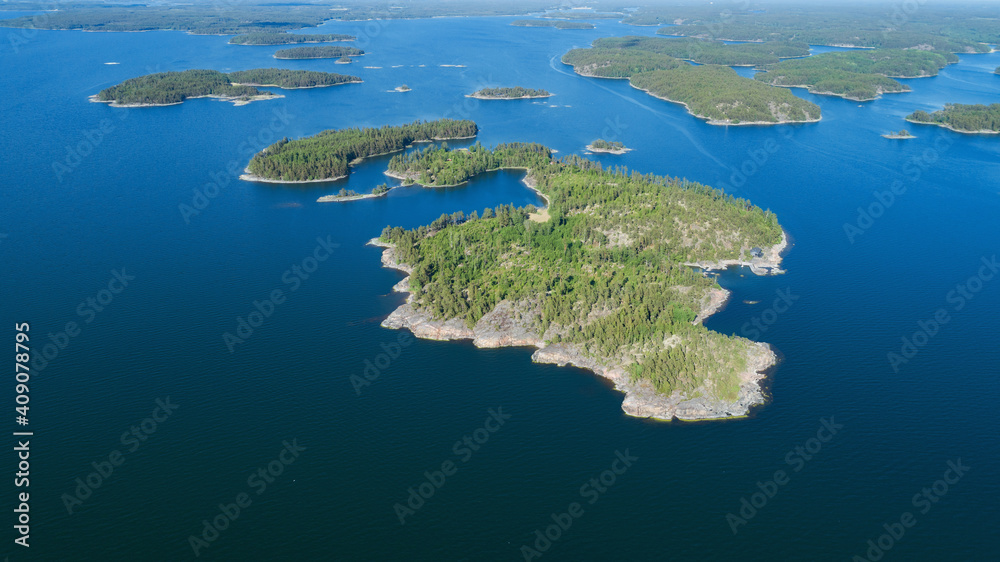 Aerial view of beautiful islands with green trees and rocks on the baltic sea. Saaristomeri, Finland. Travel concept.