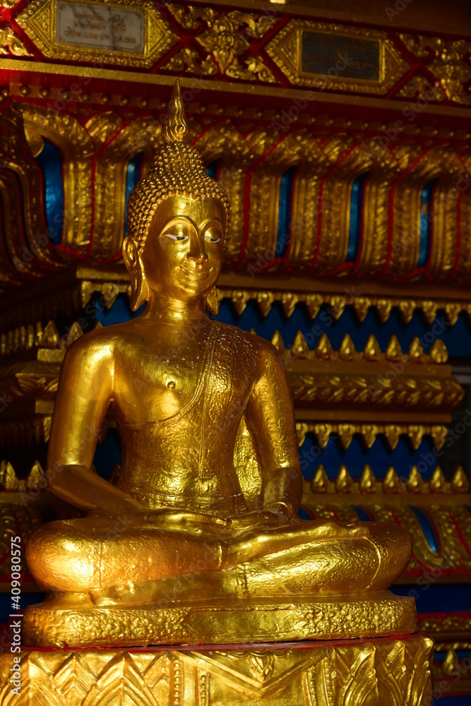 The golden Buddha image. Reverence in Buddhist sutras At Wat Luang Pothit, Thailand