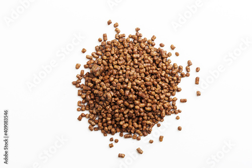  A heap of buckwheat tea on an isolated white background.