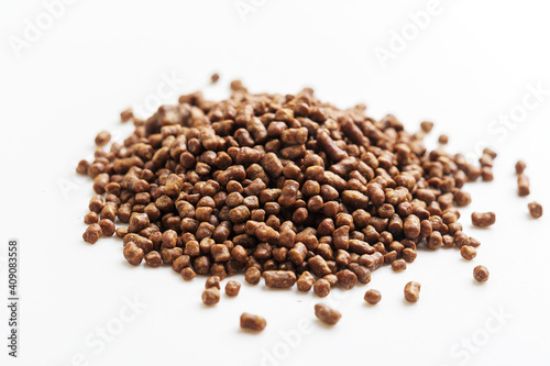  A heap of buckwheat tea on an isolated white background.