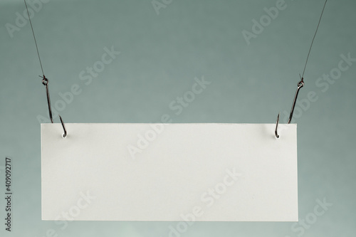 Slika na platnu blank piece of paper on a fishhook