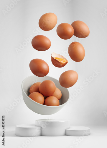 Fresh eggs flying over a winning podium photo