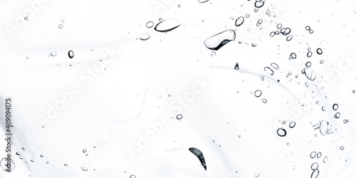 Transparent gel texture isolated on a white background. photo