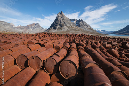 Piles of rusting fuel drums of abandoned US WW2 base Bluie East Two, Ikateq, Greenland photo