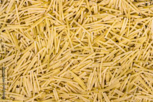 Vermicelli background, thin, organic raw pasta, food texture