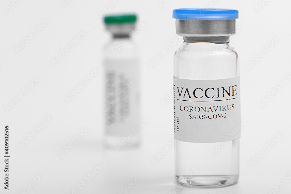 vaccine selection. Ampoules with Covid-19 vaccine in laboratory. to fight the coronavirus sars-cov-2 pandemic. Glass vial medical close-up isolated on a white background. vaccine selection. Ampoules with Covid-19 vaccine in laboratory. to fight the coronavirus sars-cov-2 pandemic. Glass vial medical close-up isolated on a white background.