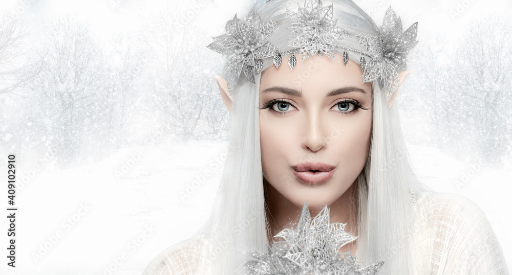 Winter queen blowing at flower Winter queen blowing at flower