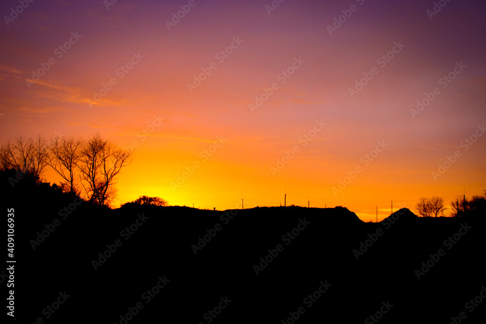 A photo of a beautiful landscape while the sun is setting. near the dunes of katwijk aan zee, Netherlands. A photo of a beautiful landscape while the sun is setting. near the dunes of katwijk aan zee, Netherlands.