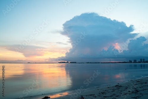 beach cloud reflections in the giant sea beautiful sunset 