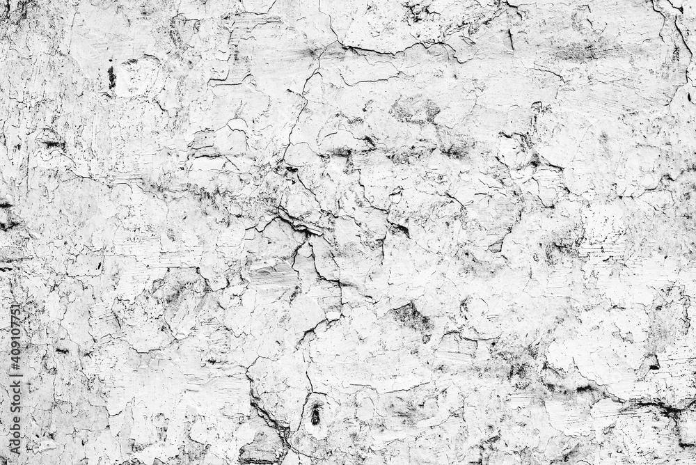Texture of a concrete wall with cracks and scratches which can be used as a background Texture of a concrete wall with cracks and scratches which can be used as a background