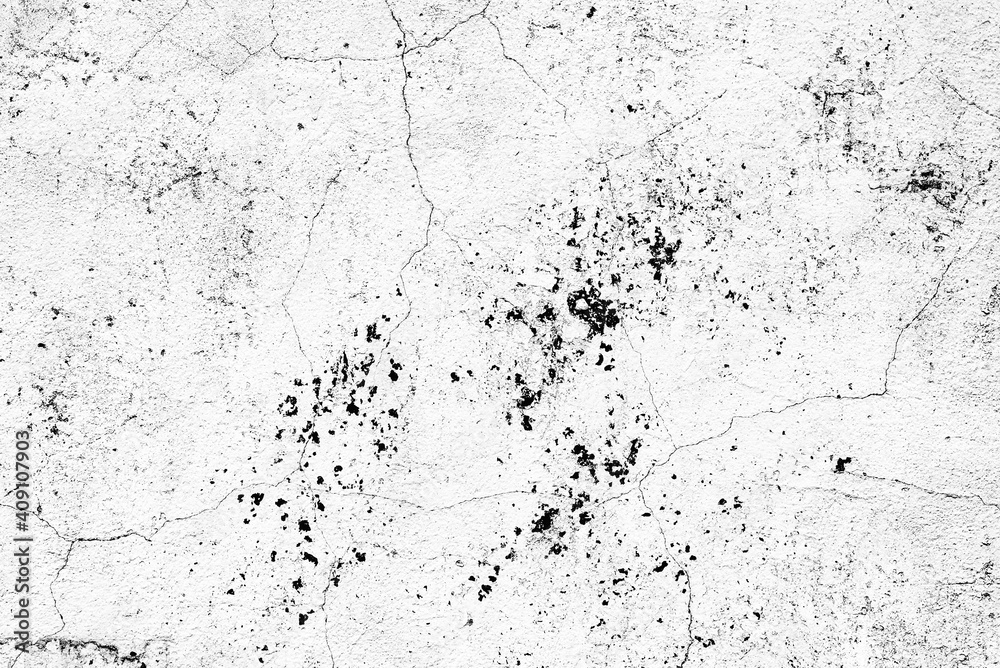 Texture of a concrete wall with cracks and scratches which can be used as a background Texture of a concrete wall with cracks and scratches which can be used as a background