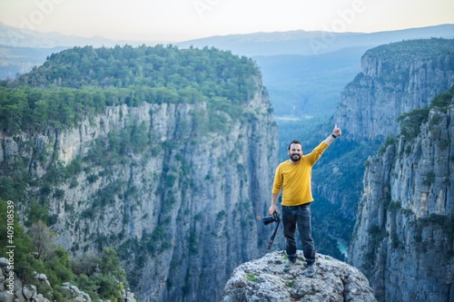 A photographer on the cliffs in Tazi Canyon in Antalya