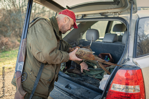 man with a car with his prey