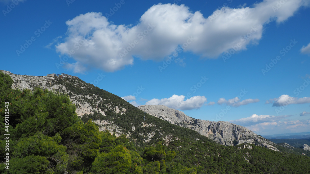 Beautiful mountain of Parnitha on a winter cloudy morning with clear blue sky, Attica, Greece