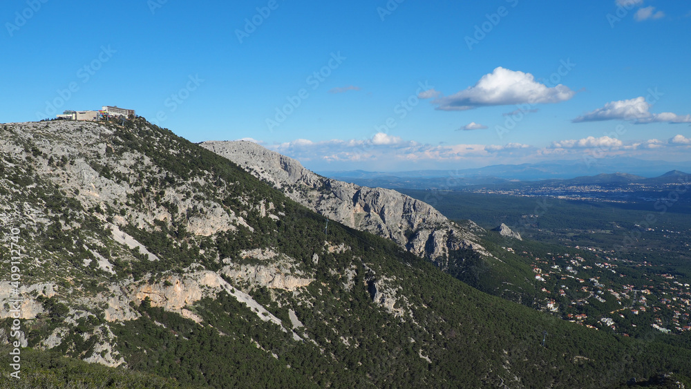 Beautiful mountain of Parnitha on a winter cloudy morning with clear blue sky, Attica, Greece Beautiful mountain of Parnitha on a winter cloudy morning with clear blue sky, Attica, Greece