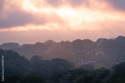 SUNSET IN THE MOUNTAINS WITH PASTEL COLORS IN COSTA RICA
