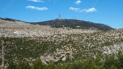 Beautiful mountain of Parnitha on a winter cloudy morning with clear blue sky, Attica, Greece photo