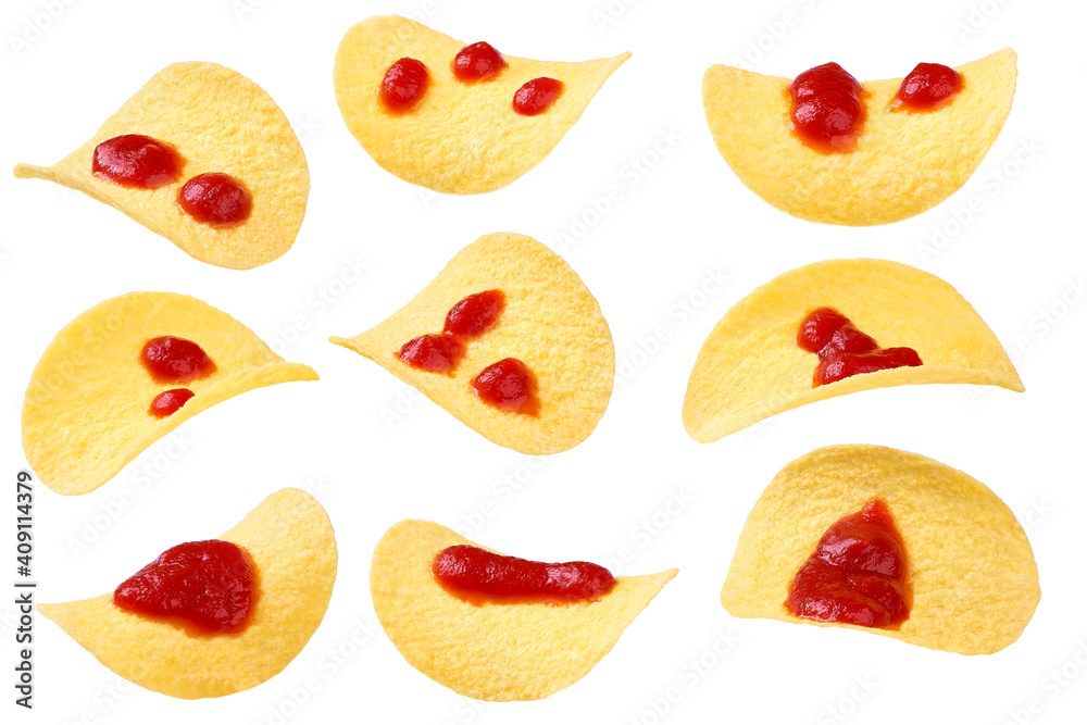 Fototapeta premium potato chips with ketchup isolated on a white background.