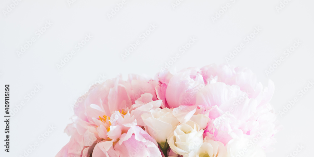 Closeup of pink pastel peony bouquet on gray banner. Floral arrangement Closeup of pink pastel peony bouquet on gray banner. Floral arrangement