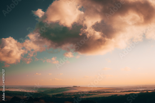 Dramatic clouds during a sunset overcasting the hills in the south coast. 