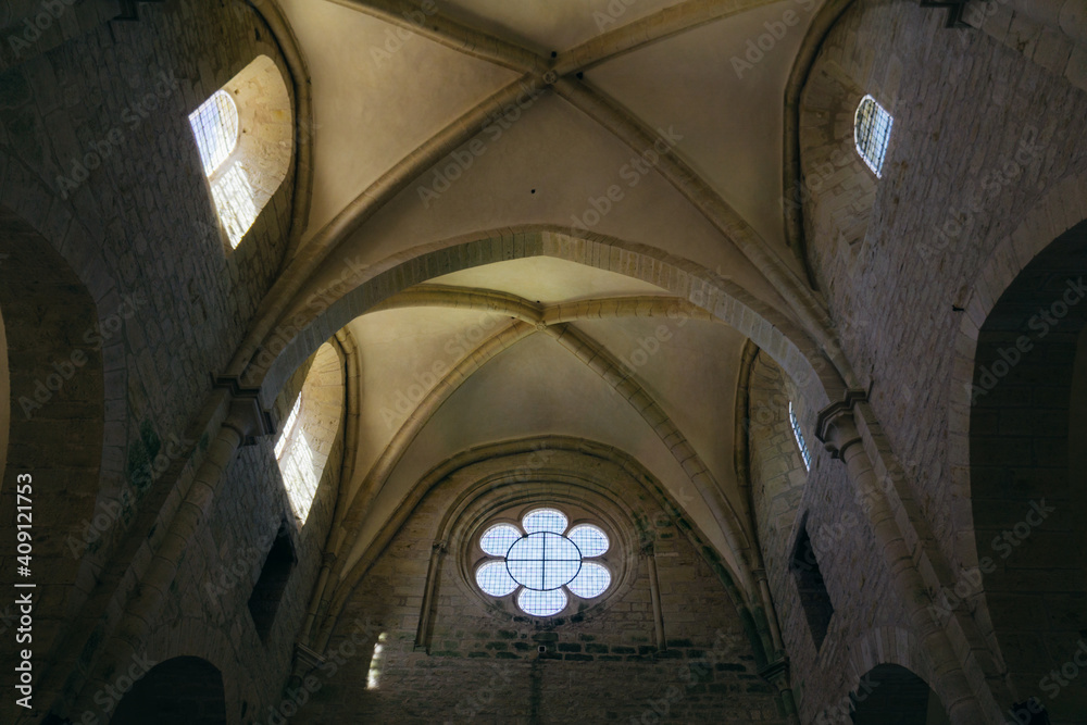 the rib vault of the ceiling of the church the Noirlac abbey, a monastery situated in Berry region (France)
