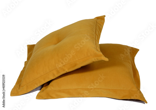 two yellow cushions for the sofa. isolated on white  copy space.