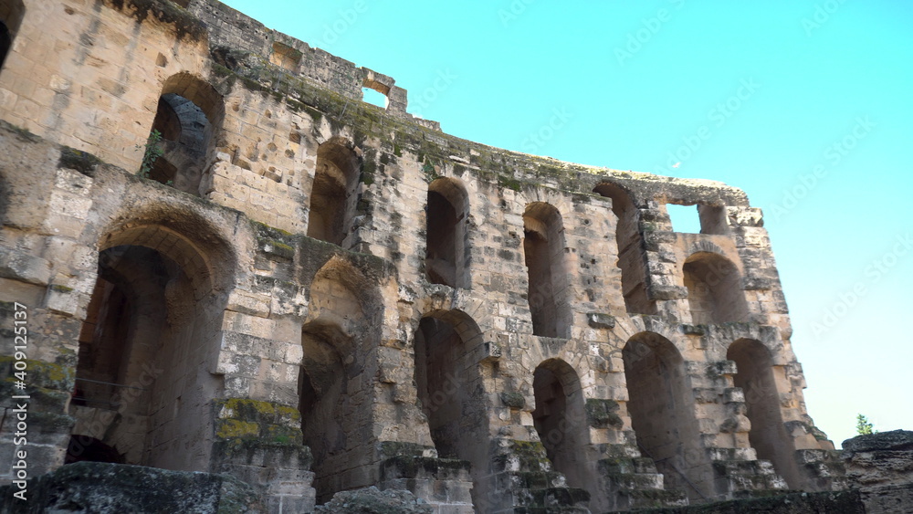 Ancient Roman ruins. Ancient amphitheater located in El Jem, Tunisia. Panoramic view. Historic Landmark
