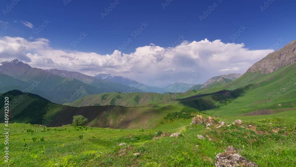 Beautiful summer landscape with fast moving clouds in Caucasus Mountains, Republic of Ingushetia, Russia, timelapse 4k