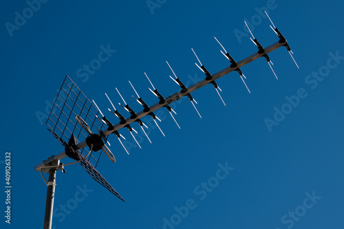 Image of a digital terrestrial television antenna on blue background