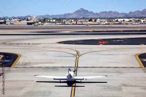 Plane on Taxiway, preparing for take off photo