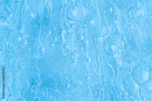 blue transparent clean drinking water abstract background. water surface with air bubbles background © Ilja