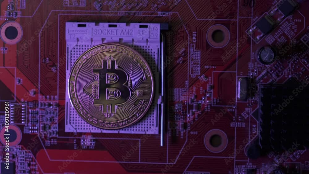 Crypto currency Gold Bitcoin - BTC - Bit Coin. Bitcoins on the motherboard. Crypto currency Gold Bitcoin - BTC - Bit Coin. Bitcoins on the motherboard.