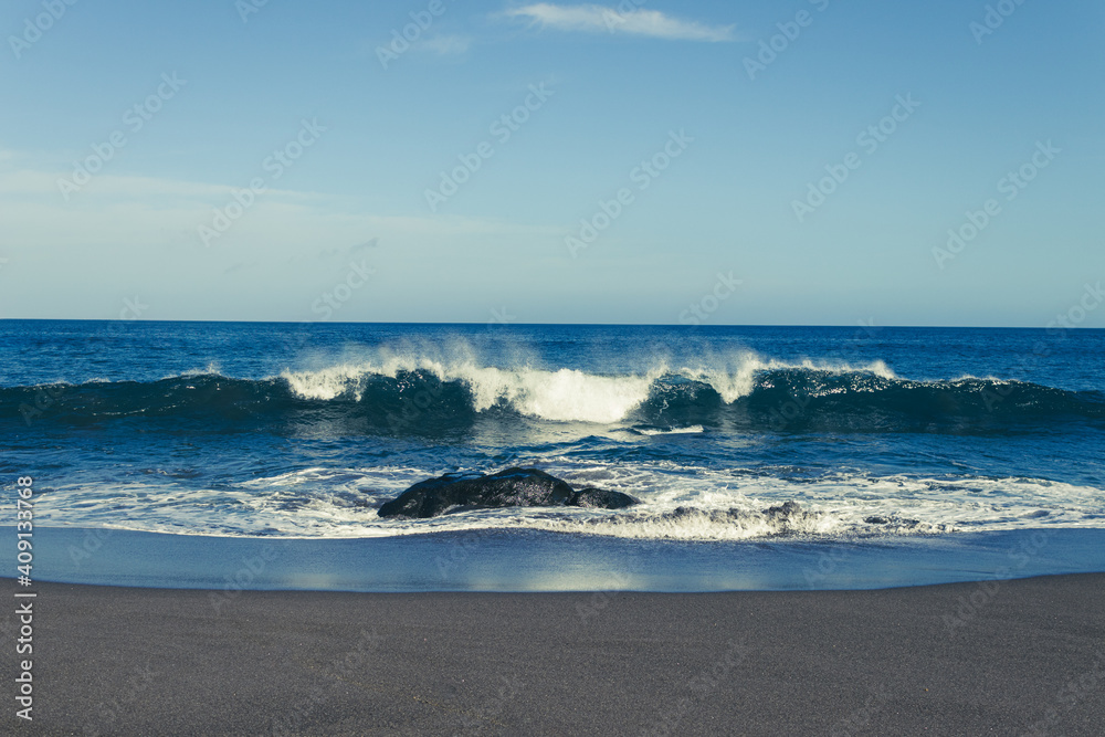 Atlantic ocean, strong waves, splashing, breaking on coast, rocks, volcanic island, Azores.
