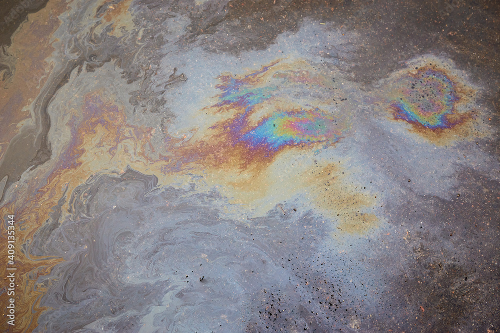 Fototapeta premium Beautiful abstract colorful background, texture:, stains from engine oil on the asphalt