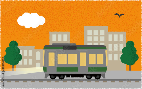 夕方、ライトを点けて都市を走る電車のベクターイラスト