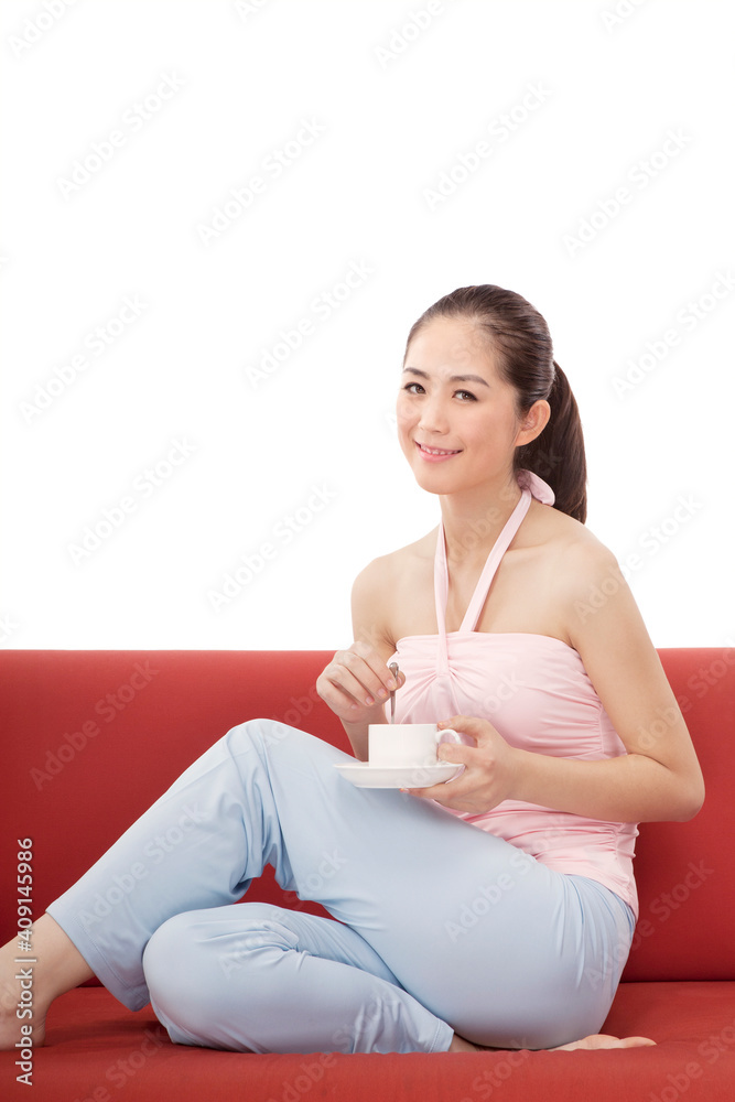 Oriental fashion woman drinking coffee Oriental fashion woman drinking coffee