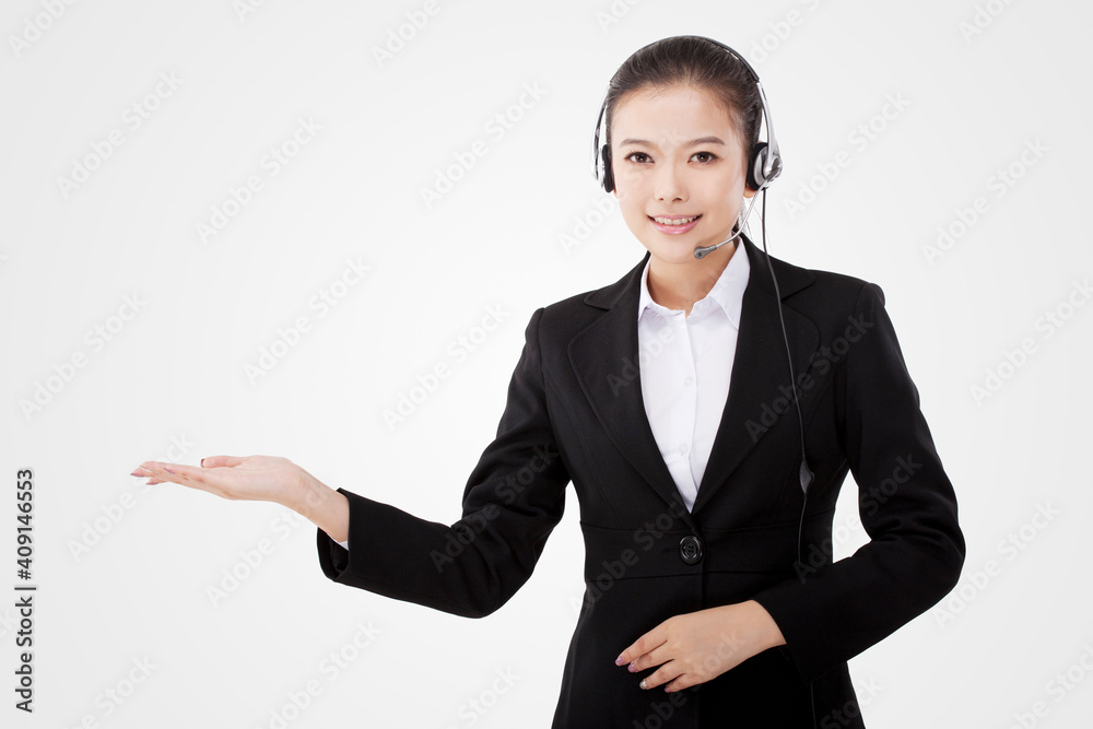 Oriental business lady wearing headset Oriental business lady wearing headset
