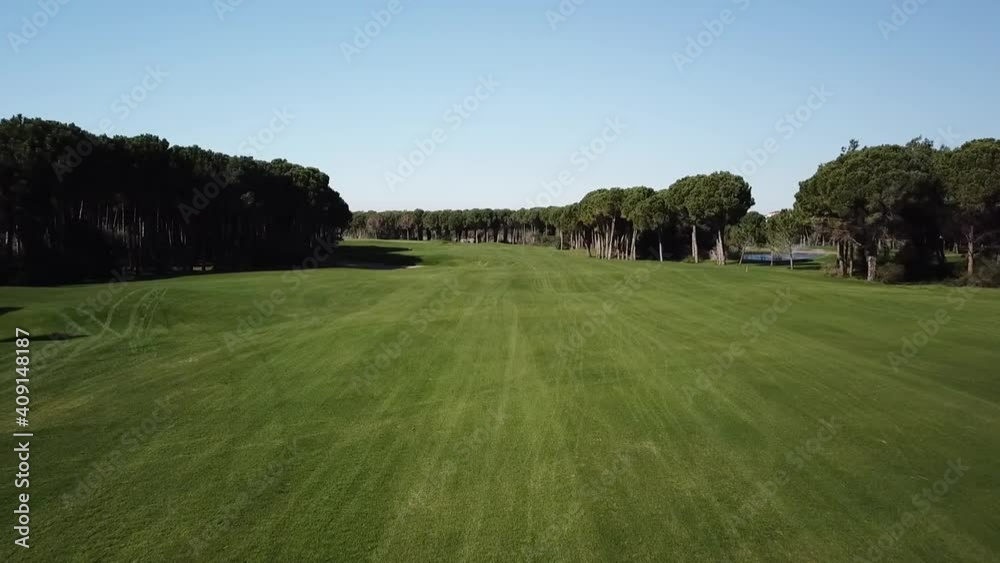 Quick flying over green and vivid golf course field in Turkey Quick flying over green and vivid golf course field in Turkey