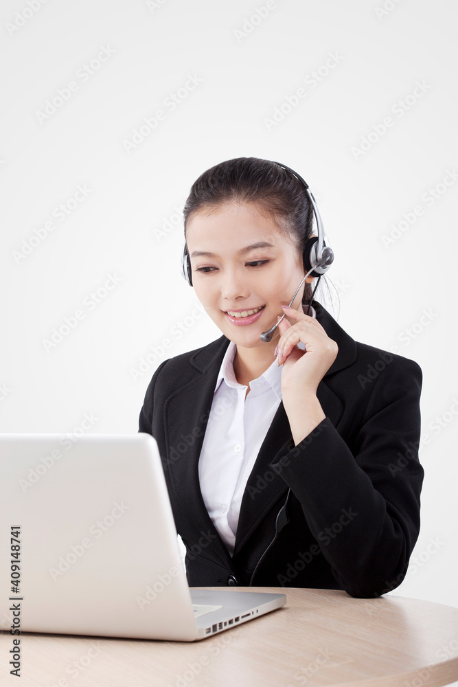 Oriental fashion business woman using computer Oriental fashion business woman using computer