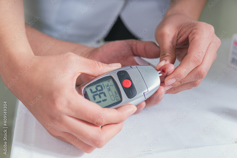 Taking blood to measure glucose Taking blood to measure glucose