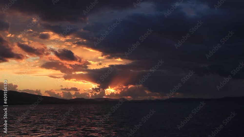 time lapse of clouds and sunset over Aegean sea time lapse of clouds and sunset over Aegean sea