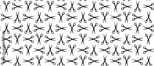 Abstract background of black scissors isolated on white.